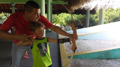 Andrew with bow and arrow